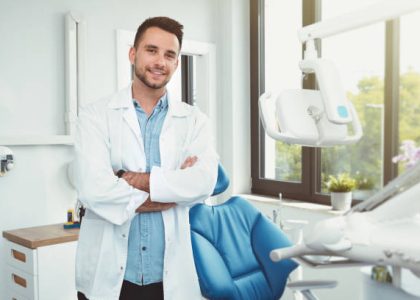 Dentist in his office, dental care, professional young doctor Dentist in his office, dental care, professional young doctor