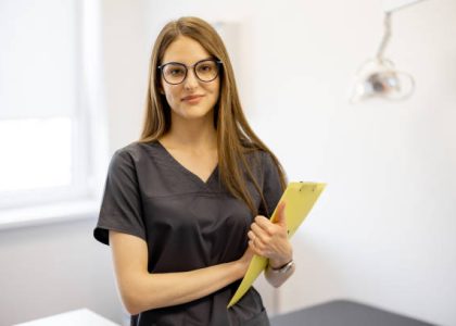 Portrait of a beautiful young female doctor or intern in a medical office Portrait of a beautiful young female doctor or intern in a medical office